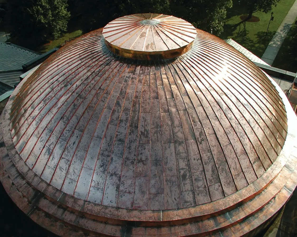 Craftsman Roofing crew installing a new roof in Southern Mattapan